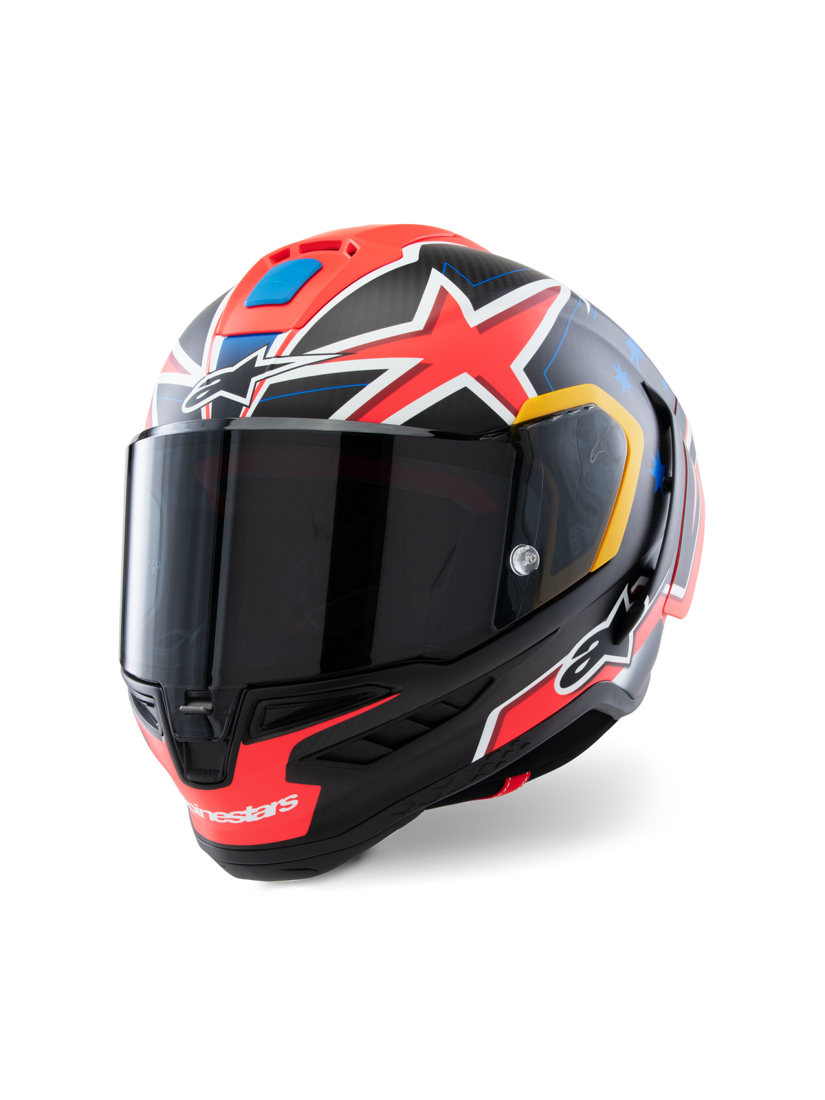 Capacete Alpinestars Supertech R10 Miller Limited Edition, capacete integral de corrida, Carbon Red Matt com estrelas vermelhas, pormenores gráficos azuis e amarelos, viseira fumada escura, calota aerodinâmica em carbono para motociclismo profissional