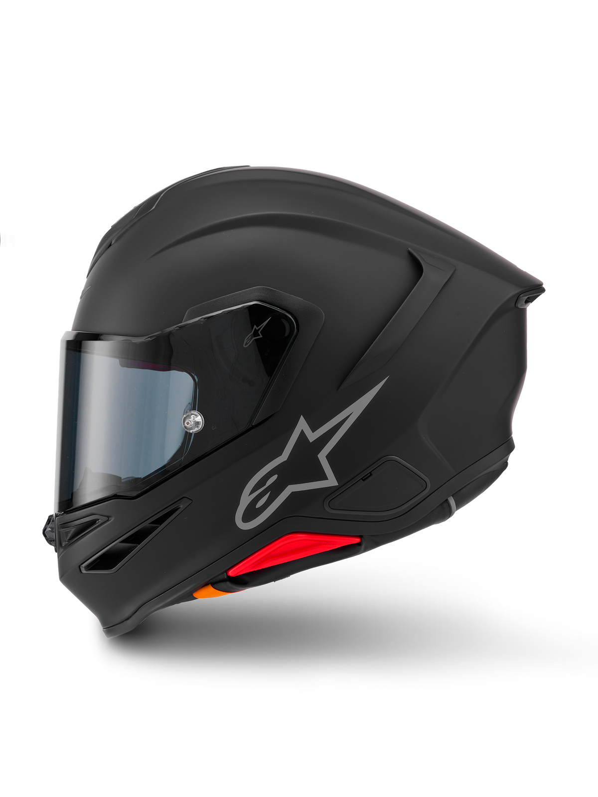 Capacete Alpinestars S-R7 Solid, capacete de motociclismo integral, preto mate, vista de perfil lateral, apresentando o logótipo Astars prateado na lateral, design aerodinâmico com spoiler integrado e entradas de ar no queixo, e detalhes em vermelho e laranja na base.