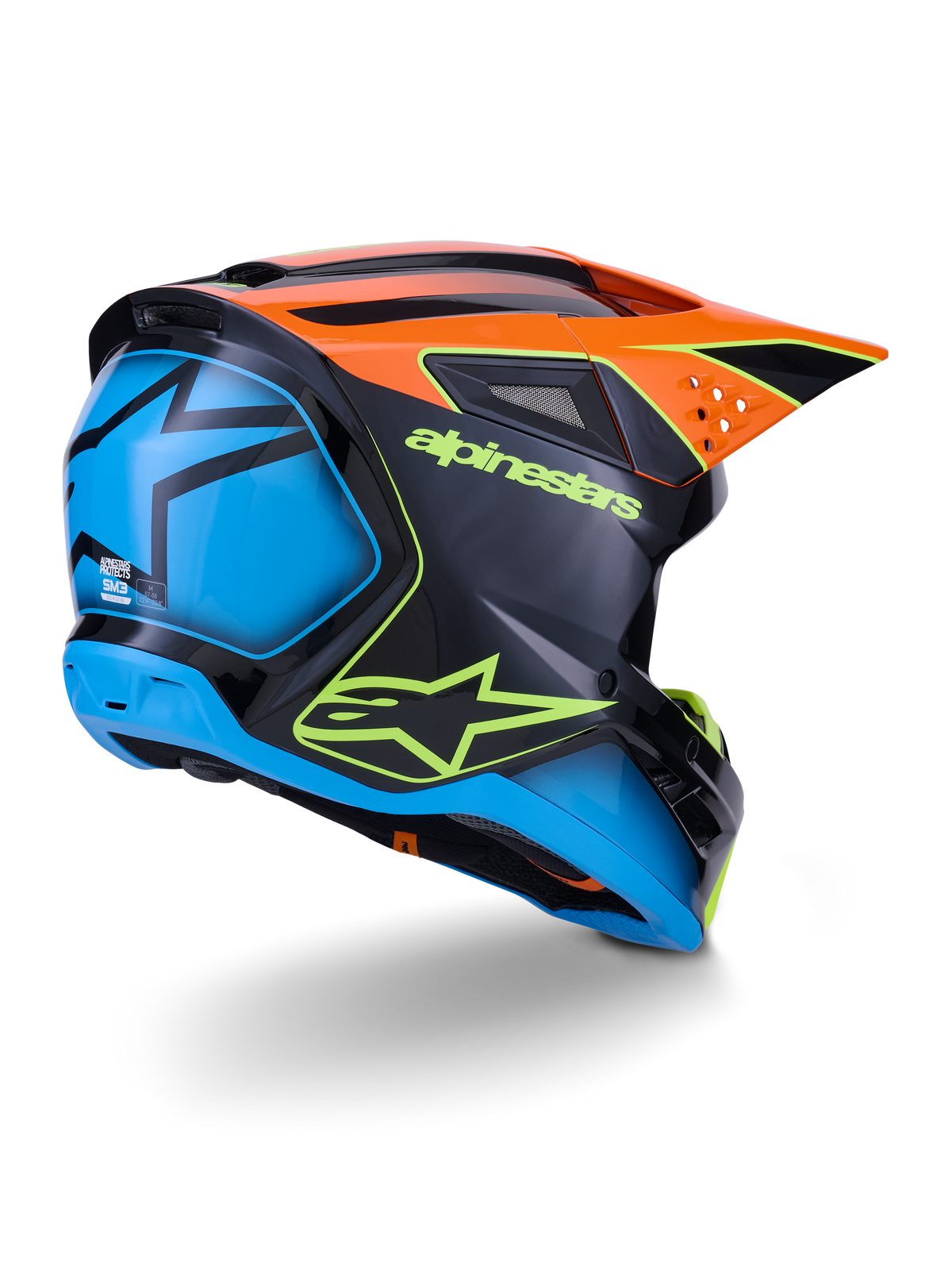 Alpinestars S-M3 Fray Helmet ECE 22.06, capacete de motocross, preto com painéis em laranja e azul, com logótipo Alpinestars em amarelo néon, secção traseira azul com gráfico de estrela, pala laranja com aberturas de ventilação integradas, equipamento de proteção profissional para todo-o-terreno