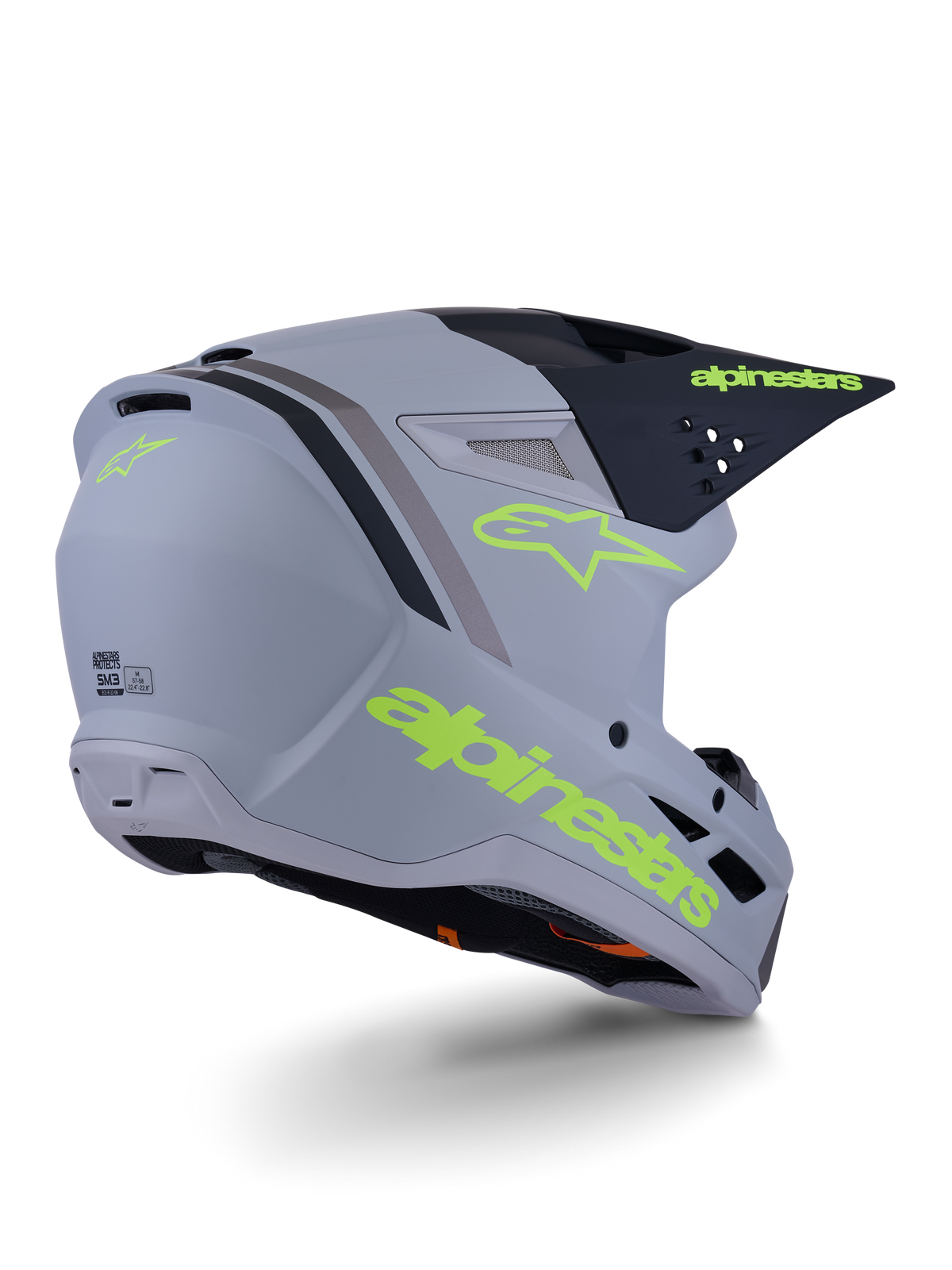 Capacete Alpinestars S-M3 Radium, capacete de motocross, cinzento, preto e amarelo fluo mate, design integral com calota angular, viseira proeminente e aberturas de ventilação, acabamento mate com grafismos arrojados
