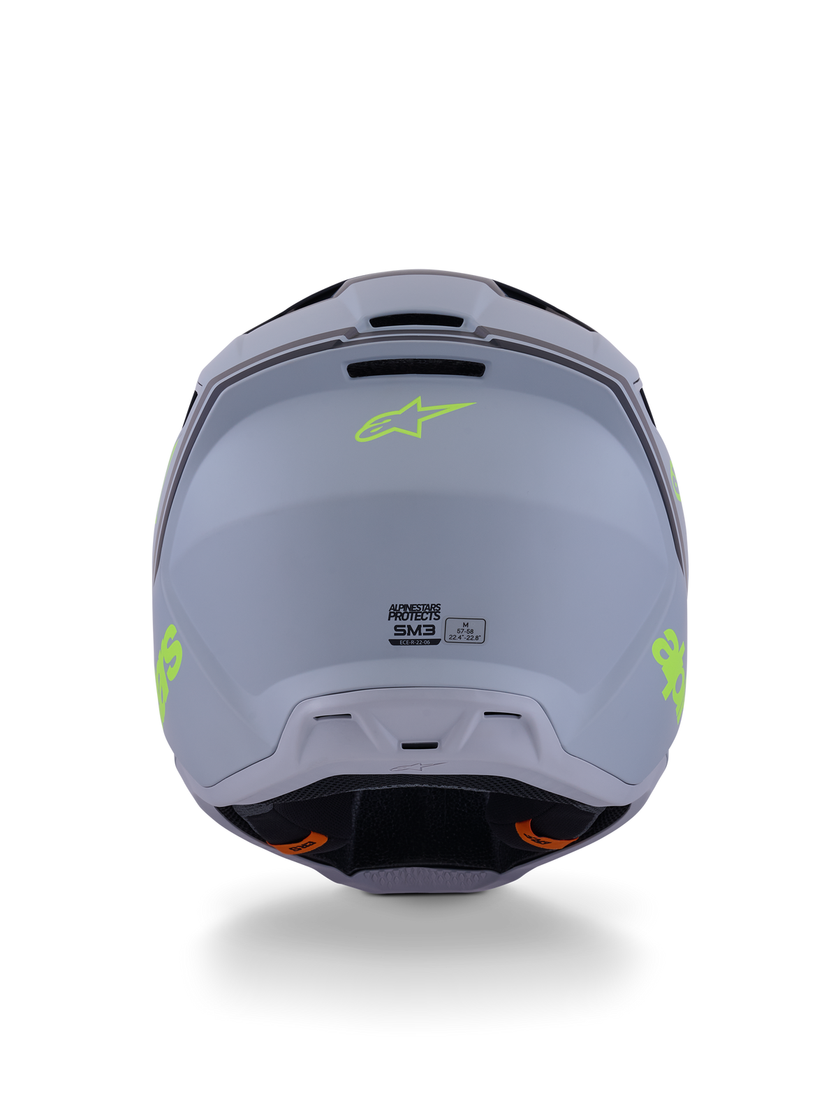 Capacete Alpinestars S-M3 Radium, capacete de motocross, verde, preto e amarelo fluo mate, vista traseira exibindo o acabamento baço da calota, logótipo Alpinestars em amarelo néon e detalhes da certificação ECE 22.06