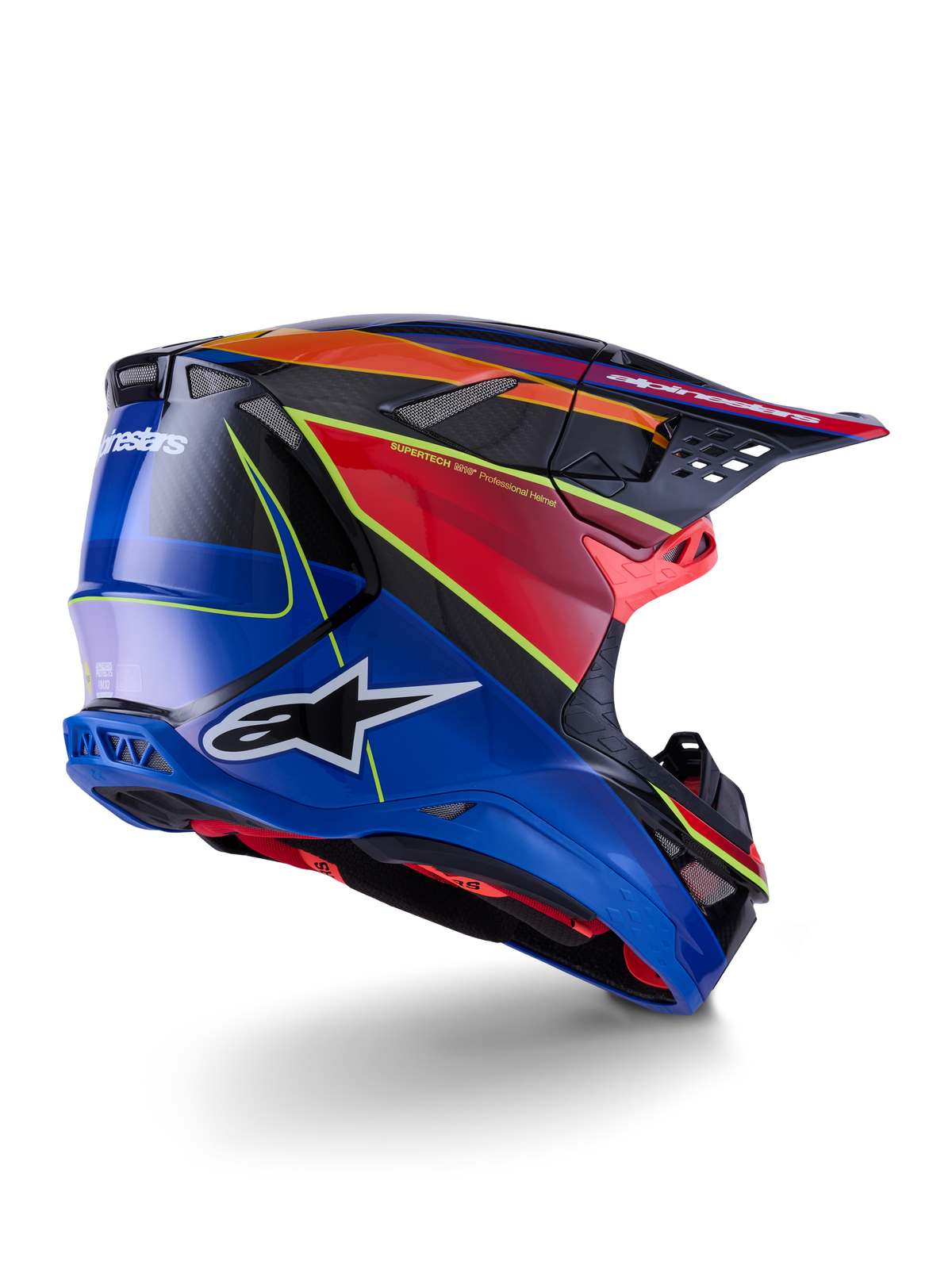 Capacete Alpinestars Supertech M10 Era, capacete de motocross, azul, vermelho e amarelo fluorescente brilhante, vista de perfil lateral traseira com detalhes em fibra de carbono, logótipo Alpinestars em destaque, aberturas de ventilação integradas e acabamento de alto brilho para performance off-road.