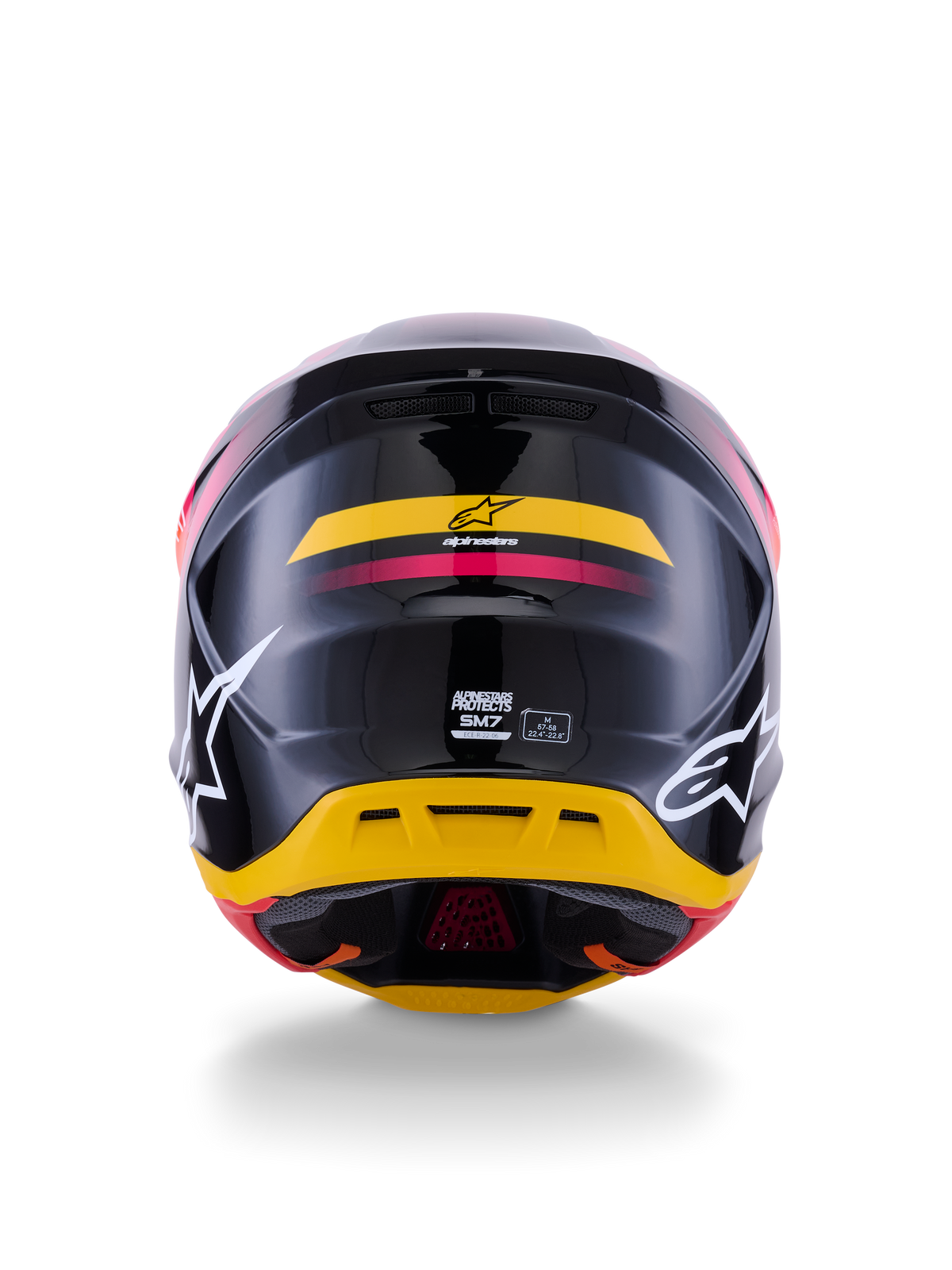 Alpinestars S-M7 Rise Helmet ECE 22.06, capacete de motocross, vista traseira, preto brilhante com detalhes em amarelo e rosa, logótipos brancos grandes nas laterais, calota em compósito aerodinâmica, equipamento de competição todo-o-terreno
