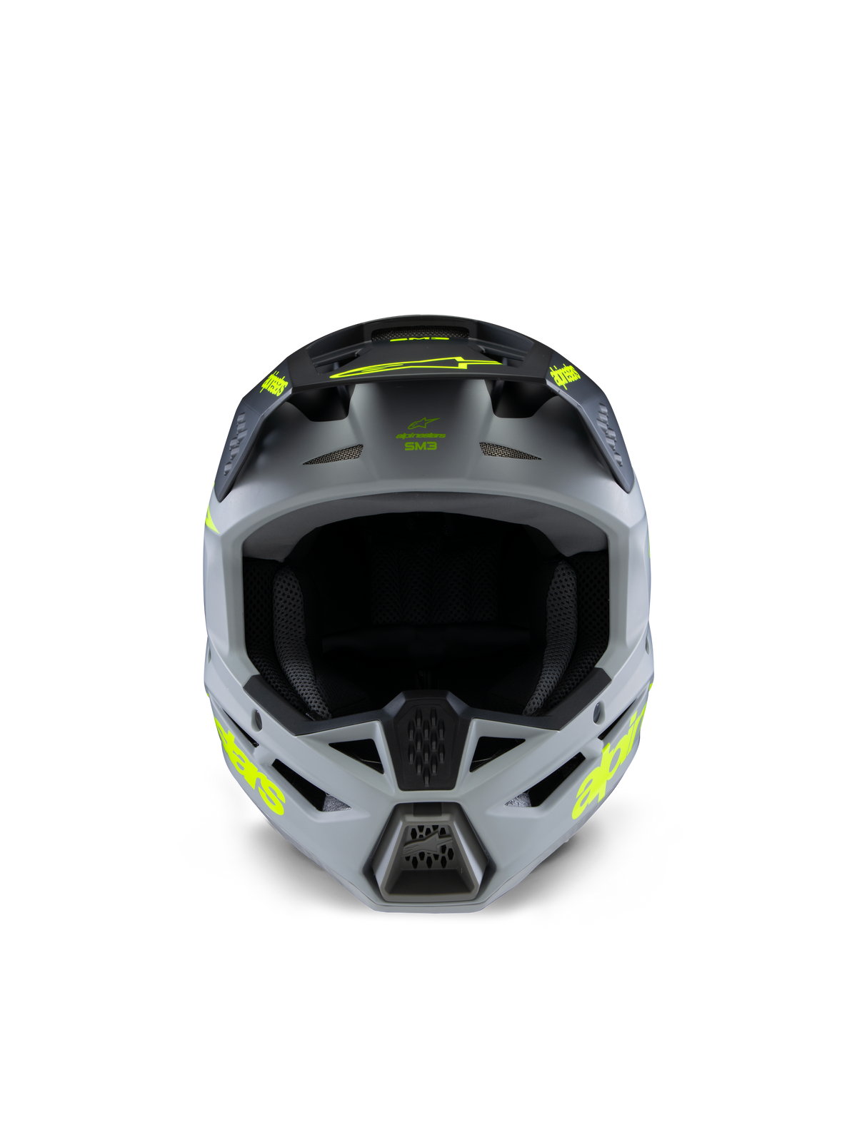 Capacete Alpinestars S-M3 Youth Radium, capacete de motocross, cinzento, preto e amarelo fluo mate, vista frontal com uma calota angular agressiva, logótipos amarelos vibrantes nas laterais e na pala, acabamento mate concebido para motocross e corridas off-road para jovens