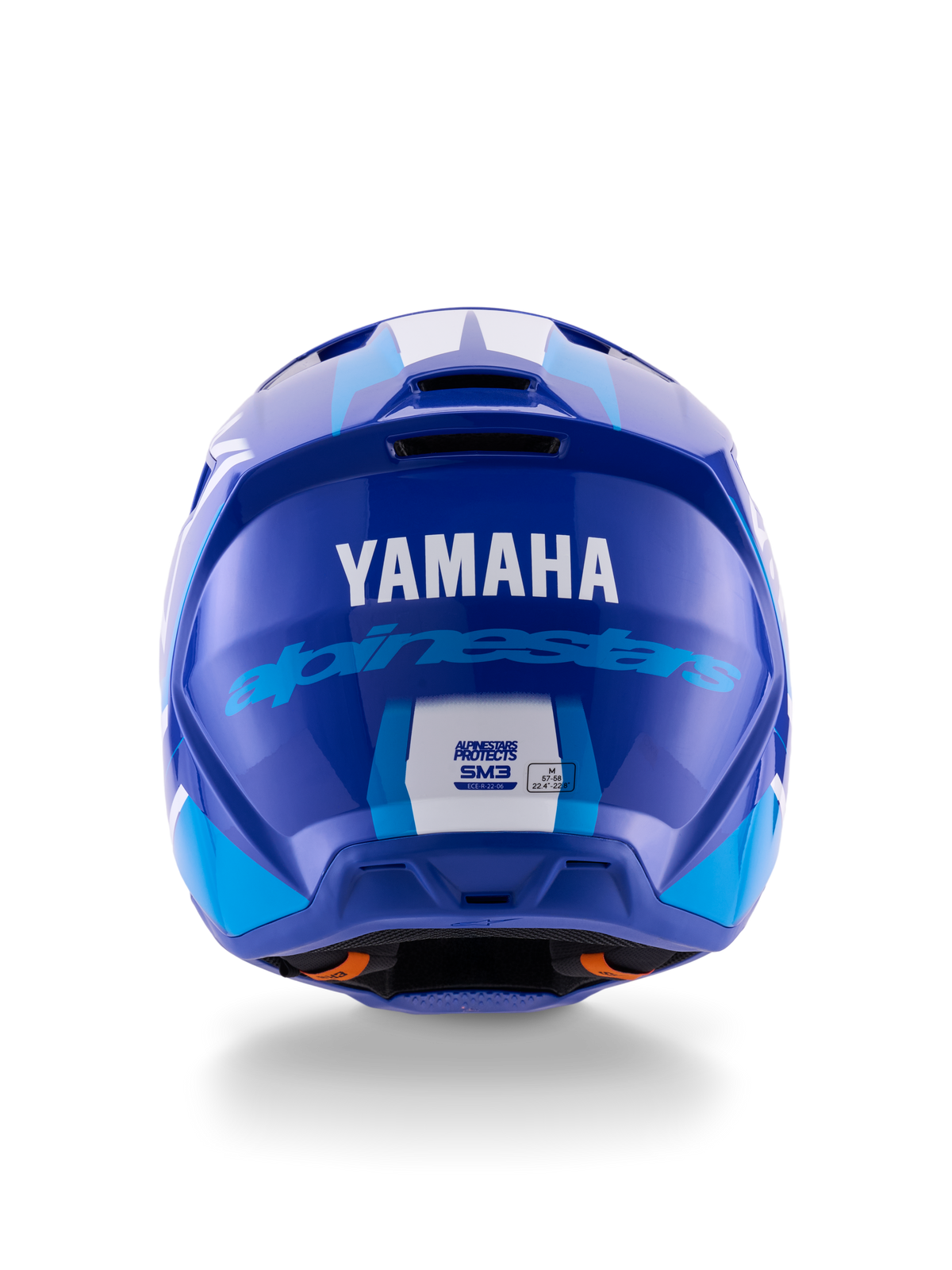 Alpinestars Yamaha S-M3 Helmet, capacete de motocross, azul e branco brilhante, vista traseira com o logótipo YAMAHA a branco e a inscrição Alpinestars a azul, acabamento brilhante com entradas de ventilação visíveis e etiquetas de certificação de segurança
