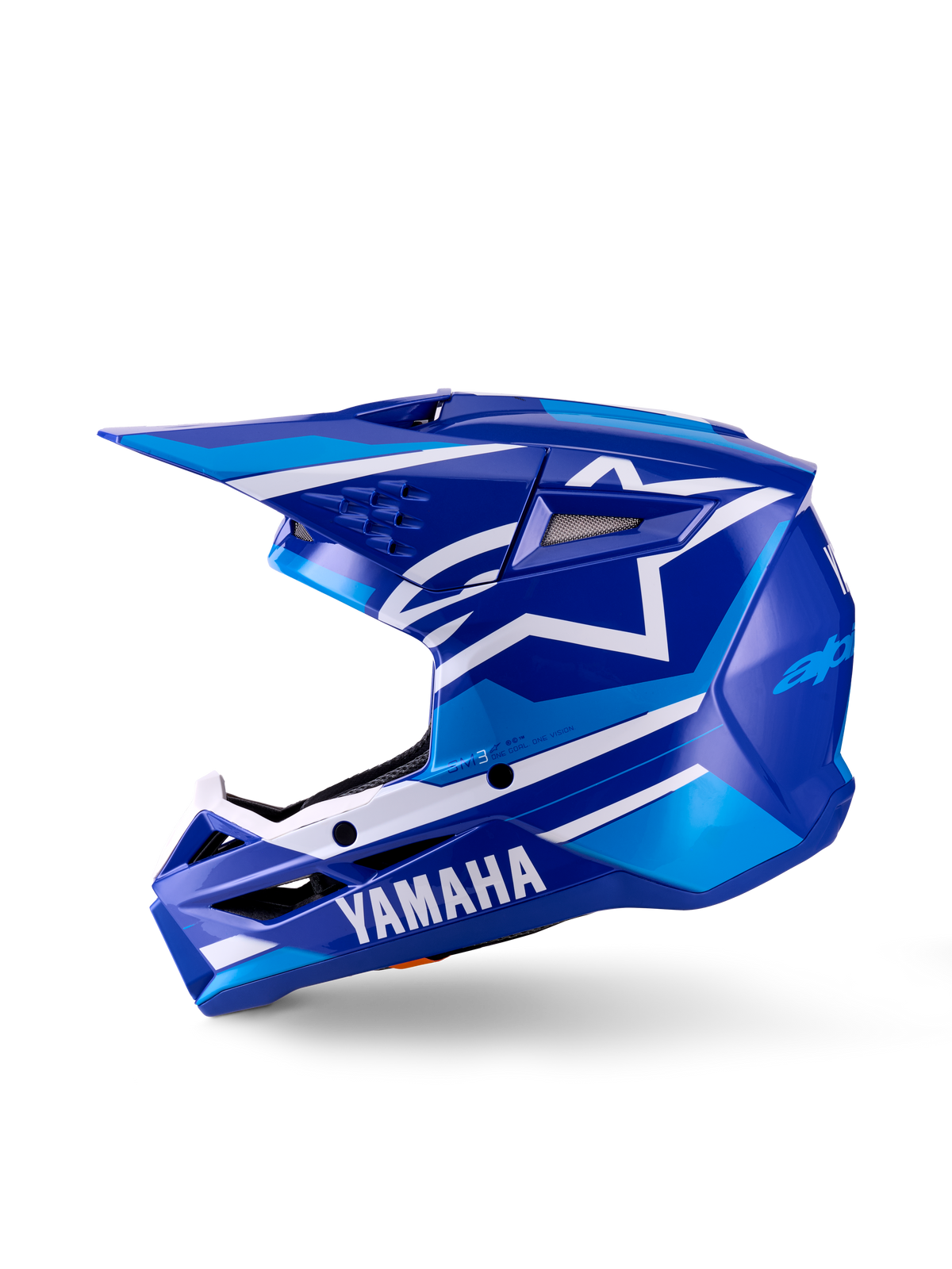 Capacete de Motocross Yamaha S-M3 para Jovens, capacete de motocross, azul e branco brilhante, vista de perfil lateral, com a marca Yamaha em destaque na proteção de queixo e o logótipo da estrela da Alpinestars, calota aerodinâmica elegante com múltiplas entradas de ventilação e viseira integrada.