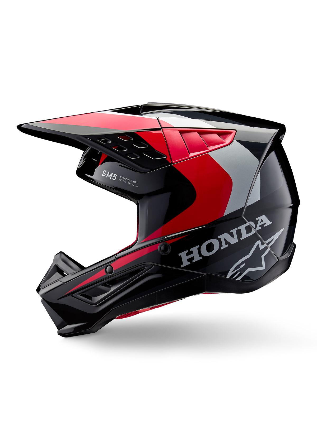 Capacete Alpinestars Honda S-M5, capacete de motocross, preto, vermelho e prateado brilhante, vista de perfil lateral com marca Honda e logótipo da estrela Alpinestars, design elegante com pala integrada e aberturas de ventilação para performance todo-o-terreno