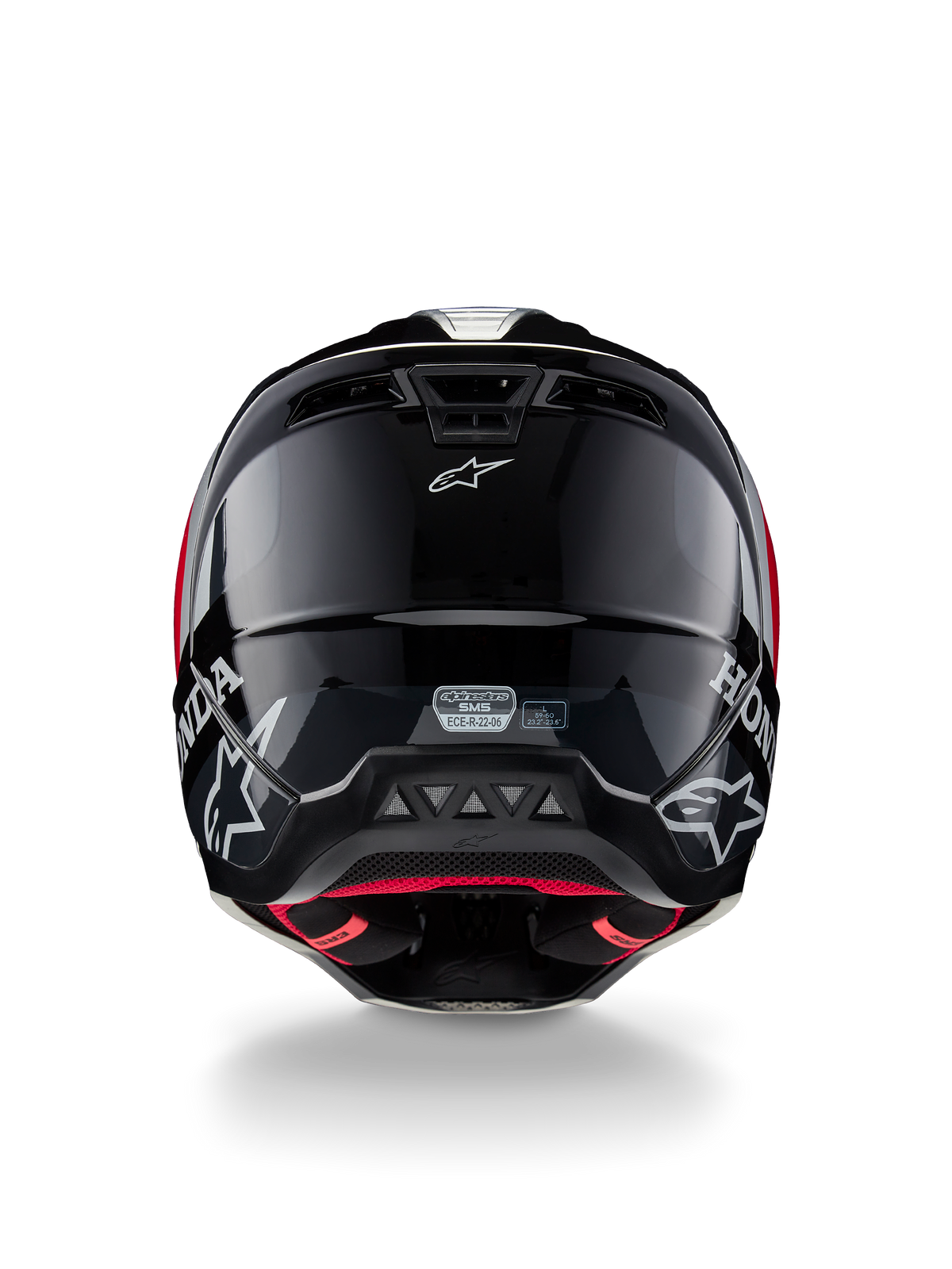 Capacete Alpinestars Honda S-M5 ECE, capacete de motocross, preto e vermelho brilhante, vista traseira mostrando a concha preta brilhante com logótipos Honda e Alpinestars brancos, forro interno vermelho e etiqueta de certificação de segurança ECE