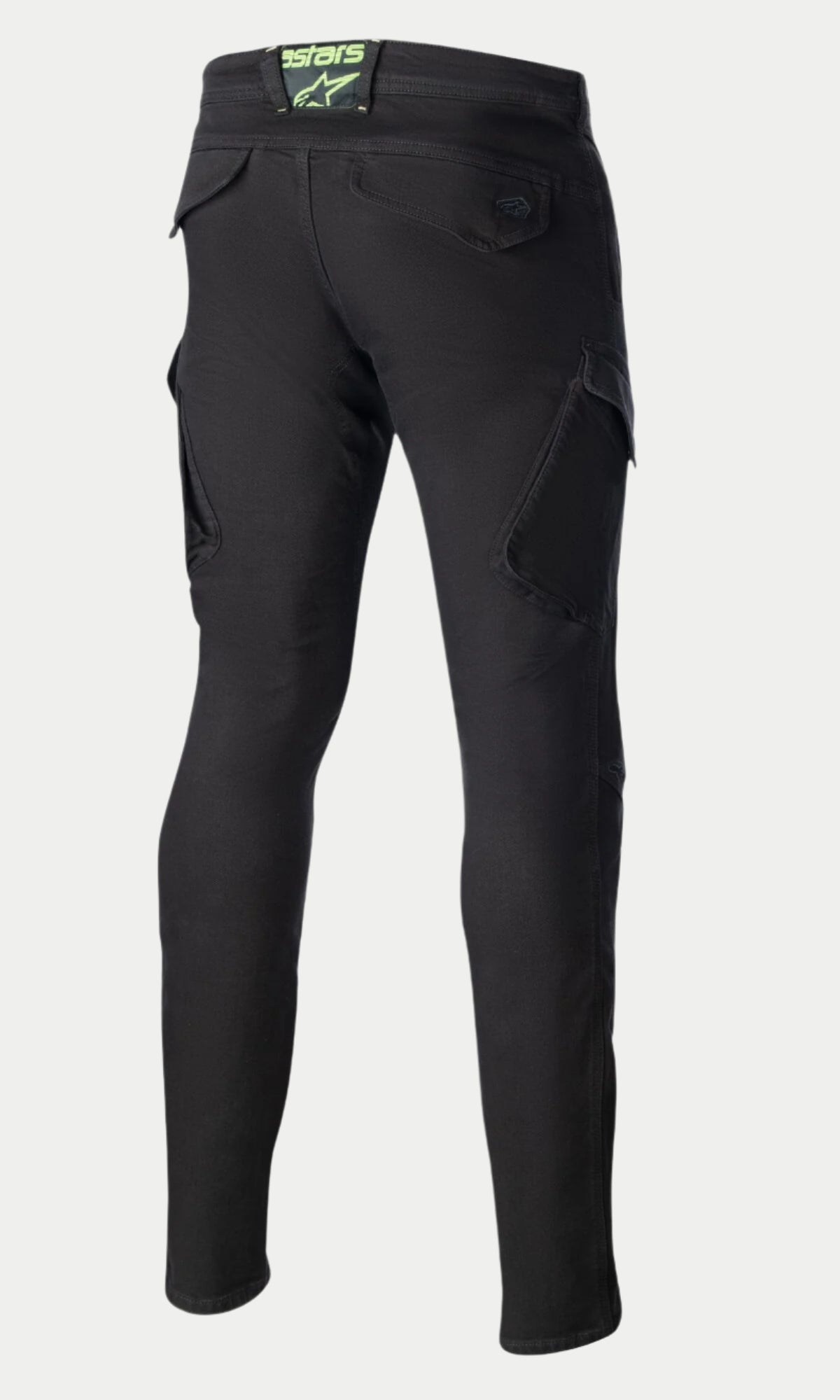 Alpinestars Caliber Slim Fit Tech Riding Pants, pretas, vista traseira realçando o corte slim afunilado, bolsos cargo de estilo combate e bolsos traseiros com aba com um patch do logótipo em verde-lima no cós