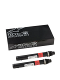Alpinestars Tech-Air 3 V2 Airbag System Replacement Canisters, two black cylindrical argon gas inflators with red warning labels, black Tech-Air Inflator Kit box with silver Alpinestars branding, essential maintenance kit for motorcycle airbag systems