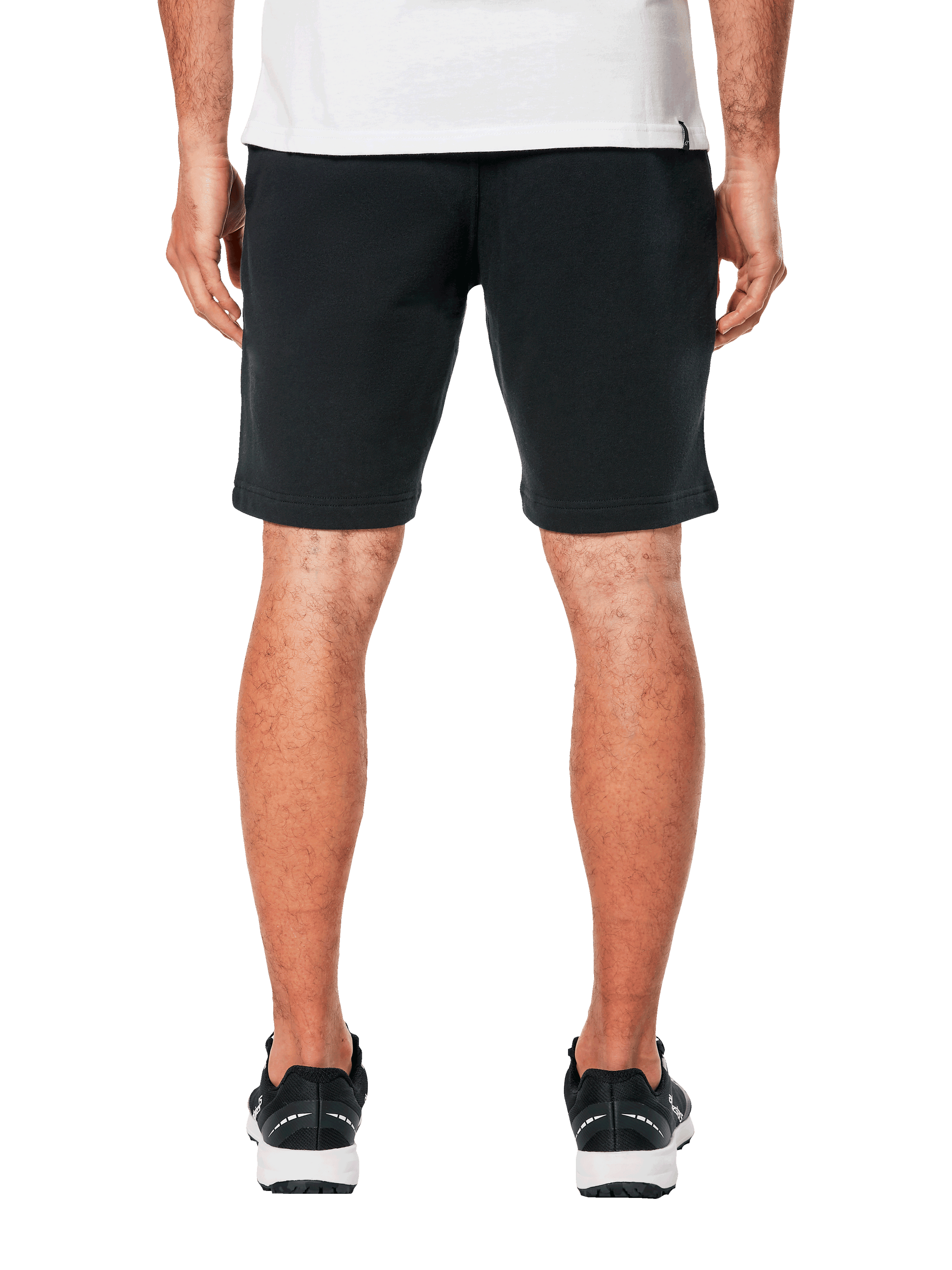Alpinestars Dunker Short, calções de treino pretos em fleece, vista traseira num modelo, cintura elástica, logótipo Ageless no quadril, corte acima do joelho, estilo desportivo e casual.