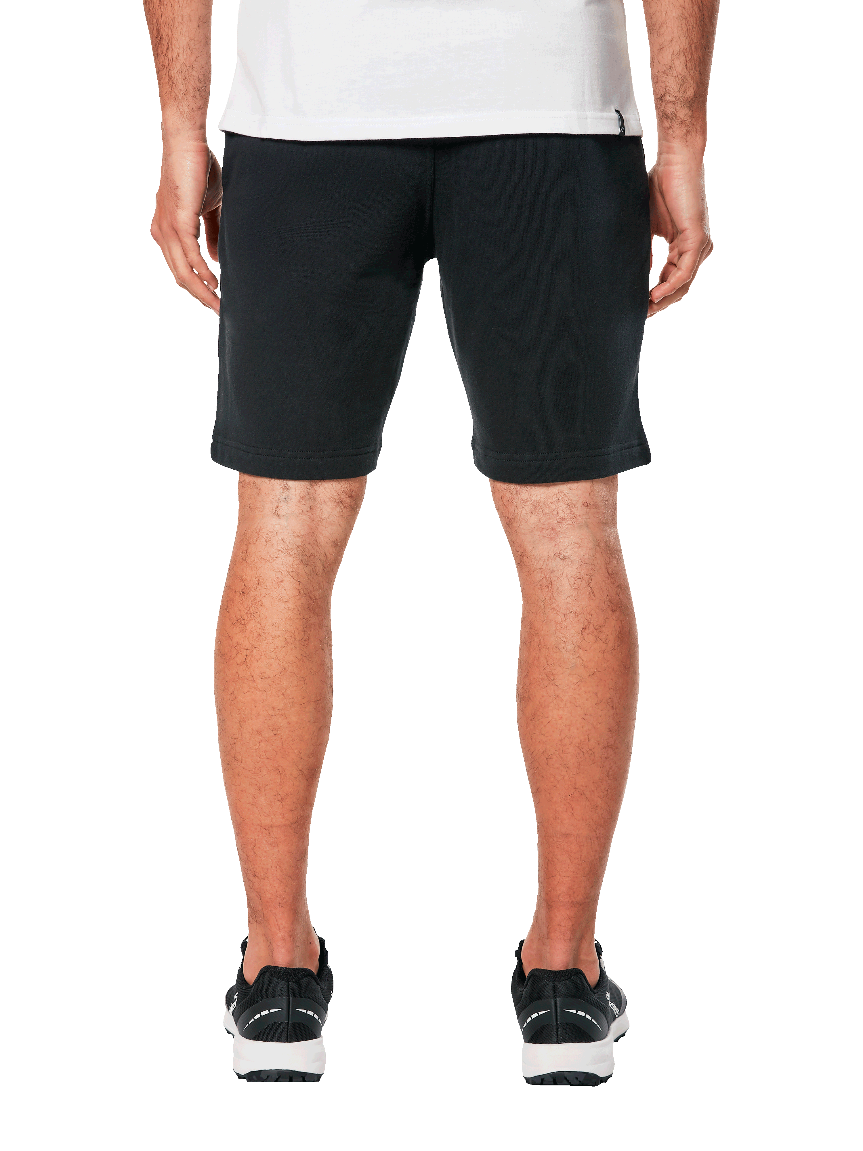 Alpinestars Dunker Short, calções de treino pretos em fleece, vista traseira num modelo, cintura elástica, logótipo Ageless no quadril, corte acima do joelho, estilo desportivo e casual.