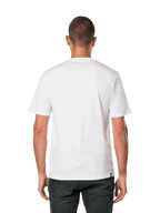 Alpinestars Blaze 2.0 CSF Tee, t-shirt de manga curta, branco e azul marinho, vista traseira de um homem a usar uma t-shirt branca lisa com calças pretas, streetwear casual de desportos motorizados