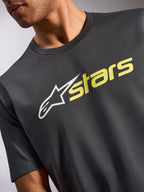 Alpinestars Blaze 2.0 CSF Tee, t-shirt de manga curta, cinzento carvão com gráfico do logótipo frontal em branco e amarelo de alta visibilidade, vestuário casual de motorsport