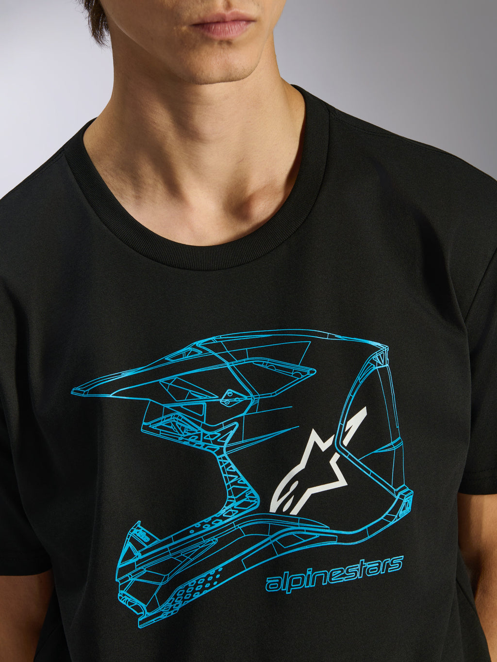 Alpinestars CSF Tee, t-shirt de manga curta, preta, grafismo de capacete de motocross azul com logótipo de estrela branco, streetwear casual de desportos motorizados