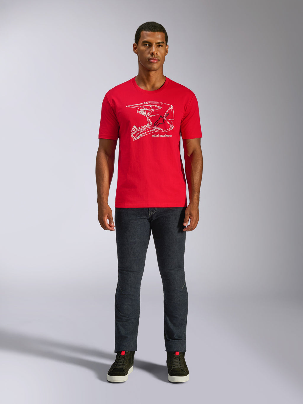 Alpinestars MX Helmet CSF Tee, Short Sleeve T-Shirt, Red, White MX Helmet Graphic, Casual Motorsport Sportswear, worn with dark jeans and sneakers