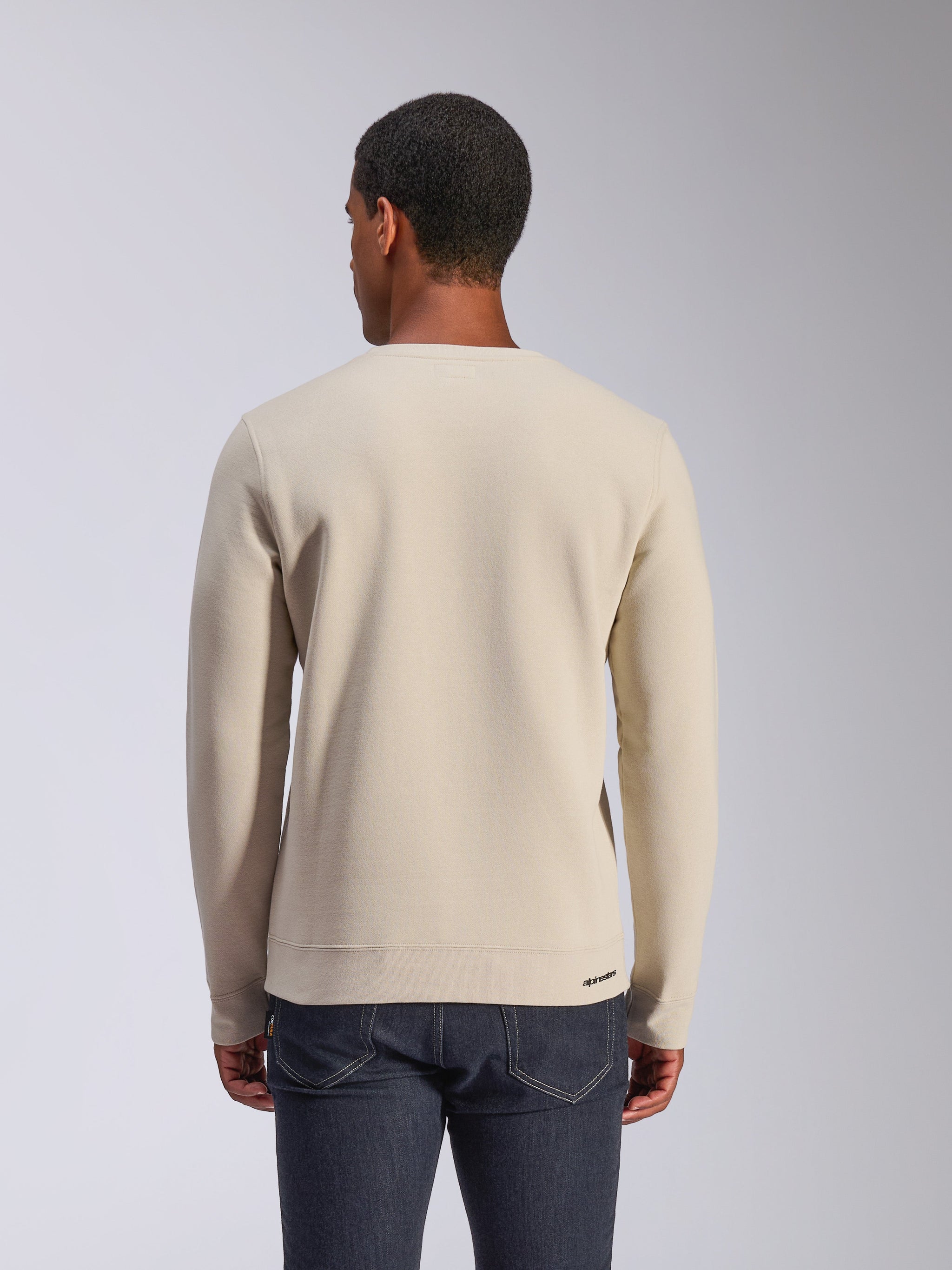 Alpinestars Positive Crew, camisola de gola redonda Off White, vista traseira, streetwear casual de desporto motorizado, bainha e punhos canelados, pequeno logótipo Alpinestars na bainha traseira