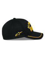 Alpinestars Luminary Hat, Black Snapback Cap, side view, curved bill with yellow sutache trim, yellow 3D embroidered logo and side star, 100% cotton twill, casual motorsport-inspired headwear