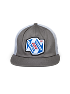 Alpinestars That Way Trucker Hat, Grey and White, structured crown with flat bill and white mesh back, featuring a large front patch with 'One Goal One Vision' graphic, casual motorsport streetwear