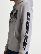 Alpinestars Camisola Com Capuz Obsessed, hoodie casual de motorsport unissexo, cinzento e preto, vista lateral no modelo destacando a marca Alpinestars vertical na manga e logótipo MX no peito, construção em algodão e poliéster reciclado.