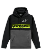 Alpinestars Parallel Hoodie, casual color-blocked pullover fleece, black top and sleeves with gunmetal grey bottom, white Astars logo on chest, vibrant yellow-green horizontal bar with black Alpinestars word logo, drawstring hood and front kangaroo pocket