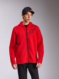 Alpinestars Transverse Hoodie, camisola vermelha com capuz e fecho frontal em tecido polar, logótipo Astars preto no peito e impressão 'One Goal', estilo casual streetwear usado com boné e calças pretas