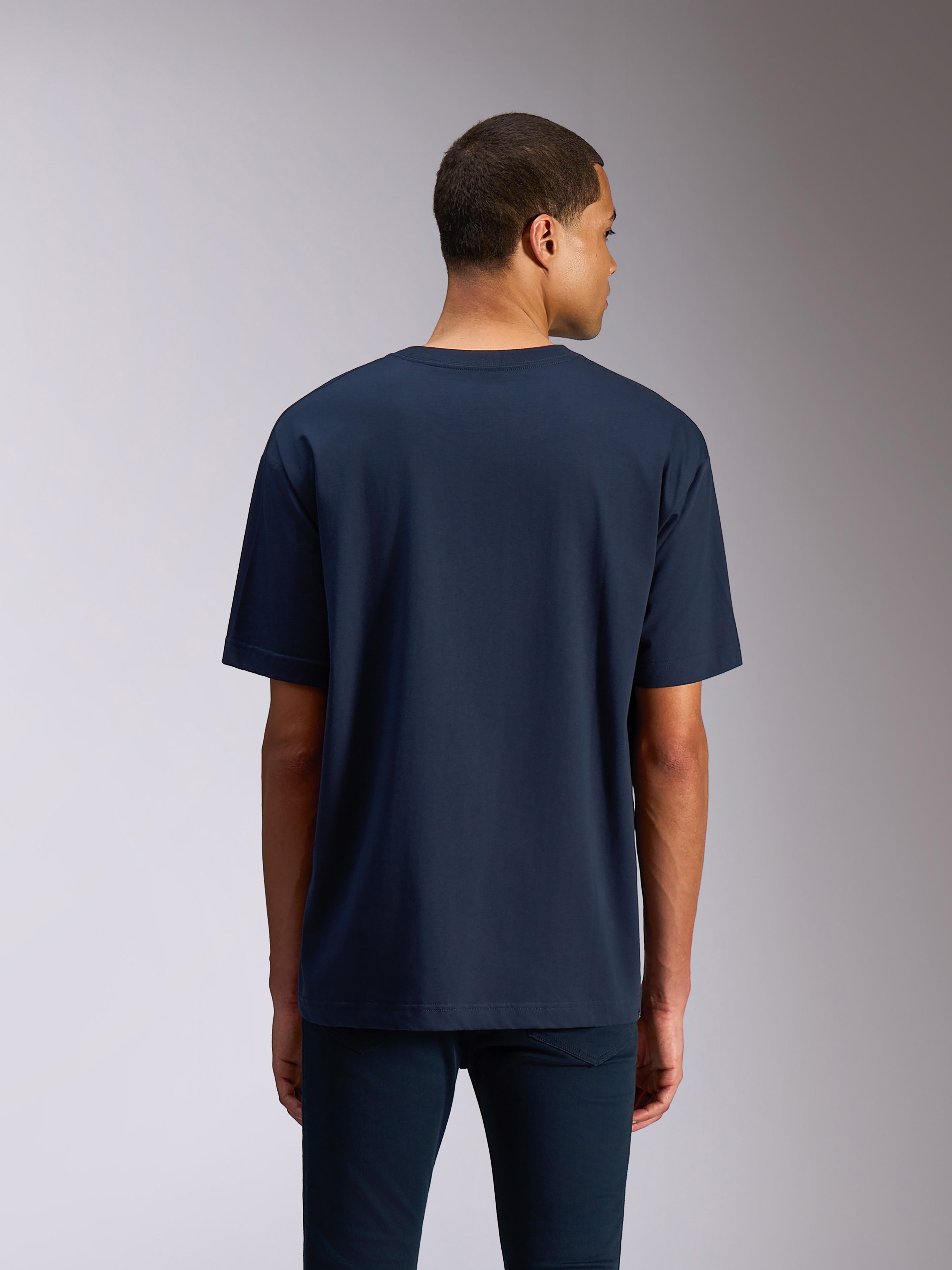 Alpinestars Alter Oversized CSF Tee, t-shirt de manga curta, azul-marinho, vista traseira mostrando o corte oversized relaxado e design liso, streetwear casual