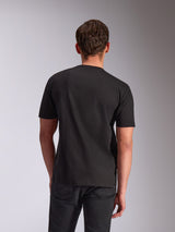 Alpinestars Trifecta CSF Tee, Short Sleeve T-Shirt, Black, back view on model, casual motorsport-inspired streetwear