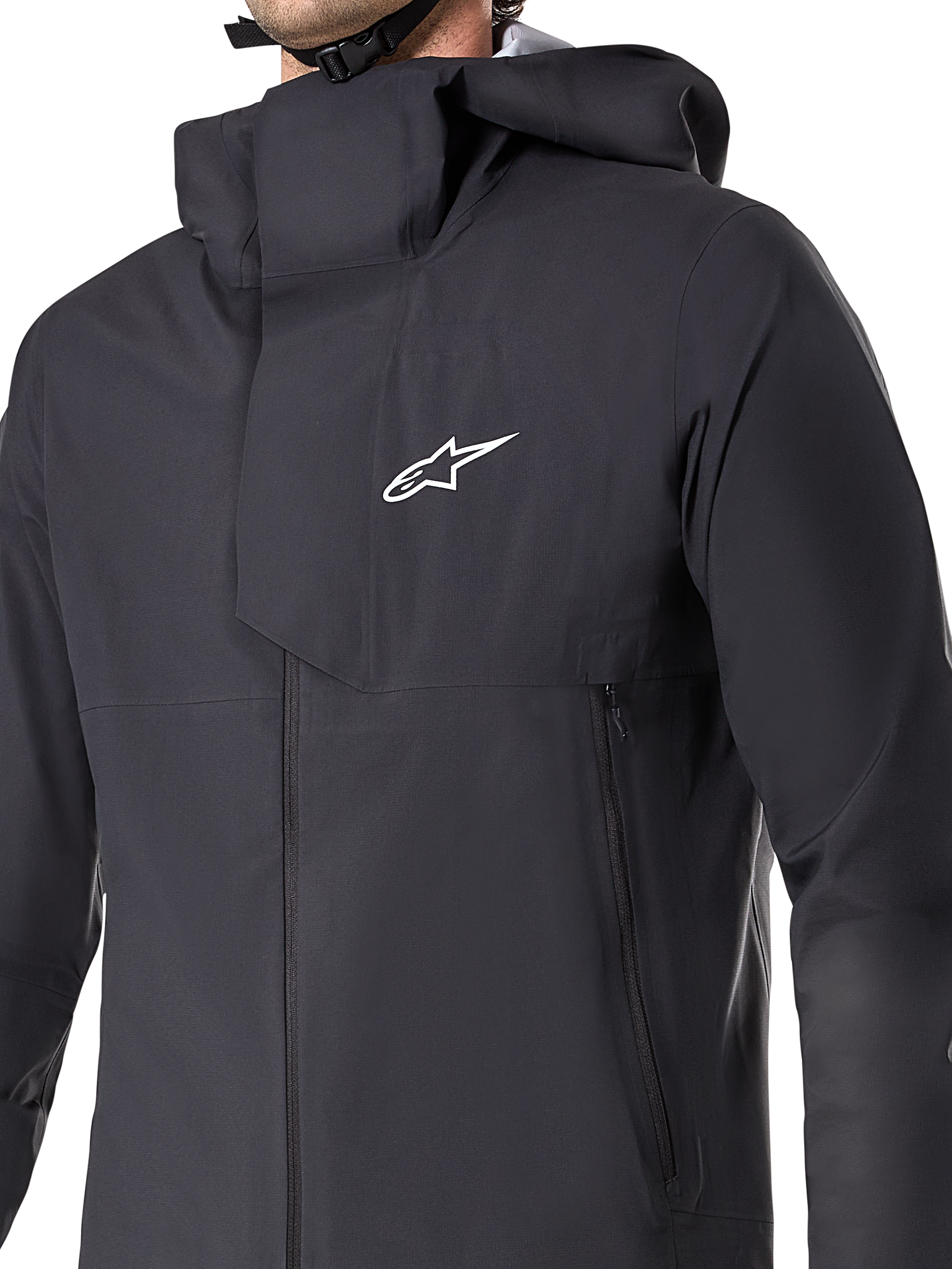 Alpinestars A-Dura Elite Waterproof Jacket, MTB Cycling Jacket, Black, featuring a 3-layer waterproof membrane, over-the-helmet hood, zippered pockets, and technical ripstop texture for mountain bike trail riding