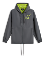 Casaco Corta-vento Alpinestars Speeder Chromium, cinzento carvão com amarelo de alta visibilidade, logótipo de estrela verde lima no peito, capuz com forro em malha, fecho frontal completo com cordão na bainha, corta-vento casual inspirado no desporto motorizado