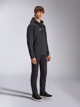 Alpinestars Frontal Hoodie, Black, pullover fleece hoodie with white HD logo on chest and wordmark logos on sleeves, kangaroo pocket, styled with black pants and sneakers, casual motorsport-inspired streetwear