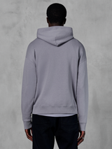 Hoodie Alpinestars Essentials Ageless, fleece cinza prateado, vista de costas, apresentando um design pullover minimalista com capuz e punhos canelados, streetwear casual inspirado no desporto motorizado
