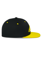 Alpinestars Thickness Snapback Hat, side profile view, Black crown with Hi-Vis Yellow flat bill and eyelets, 3D embroidered logo on front, casual motorsport-inspired headwear