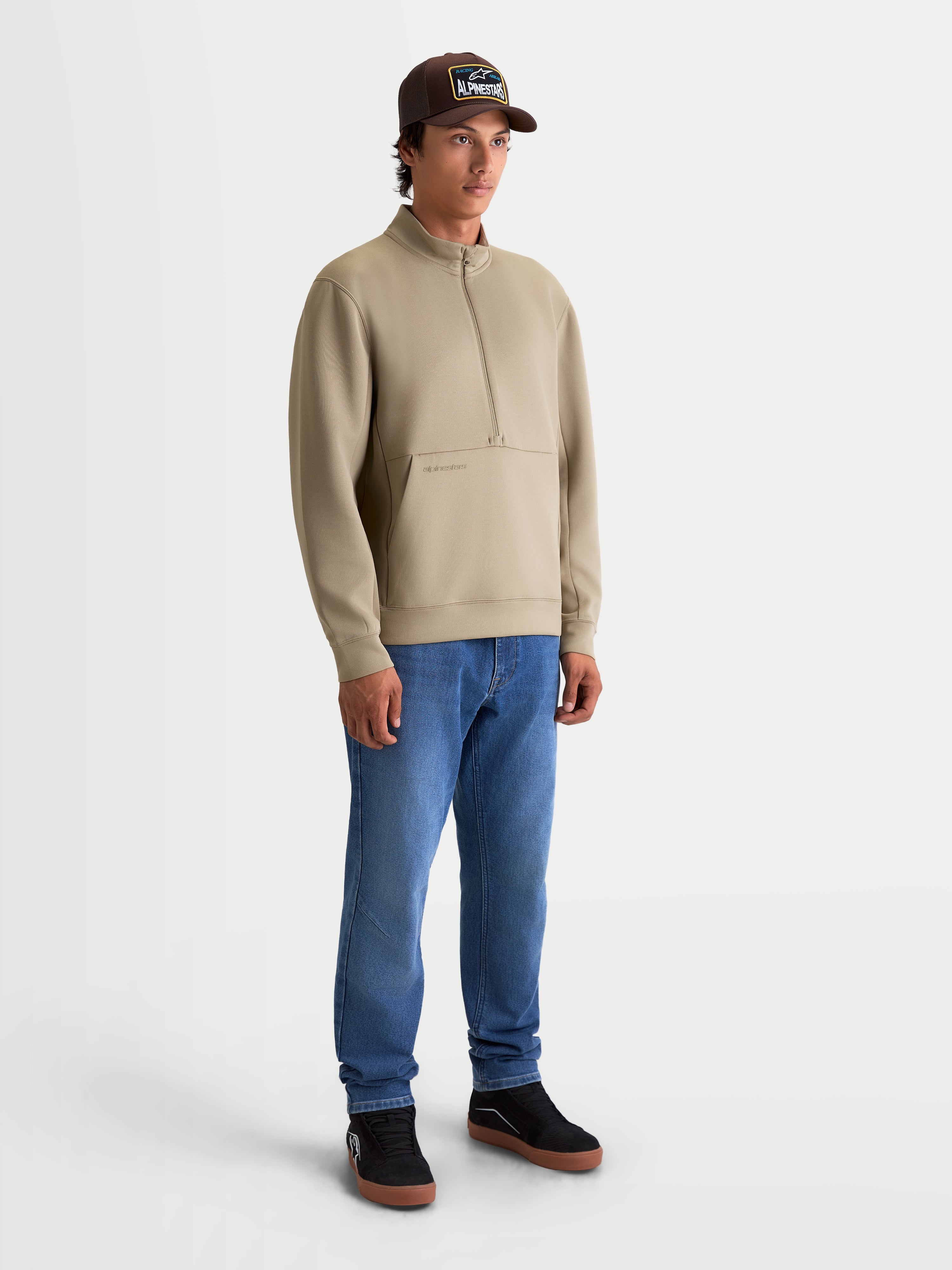 Alpinestars Apera Half-Zip Sweatshirt, Men's Sportswear Pullover Hoodie, Putty Beige, featuring a half-zip closure, kangaroo pocket, and tonal HD logo. Casual tri-blend fleece construction for motorsport-inspired lifestyle wear.