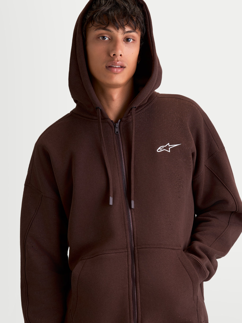 Alpinestars Entity Oversized Hoodie, Brown Sportswear Zip Fleece, Relaxed Fit Zip-Up Hoodie for Men and Women, featuring a full-length zipper, kangaroo pocket, and white embroidered Astars logo on the chest.