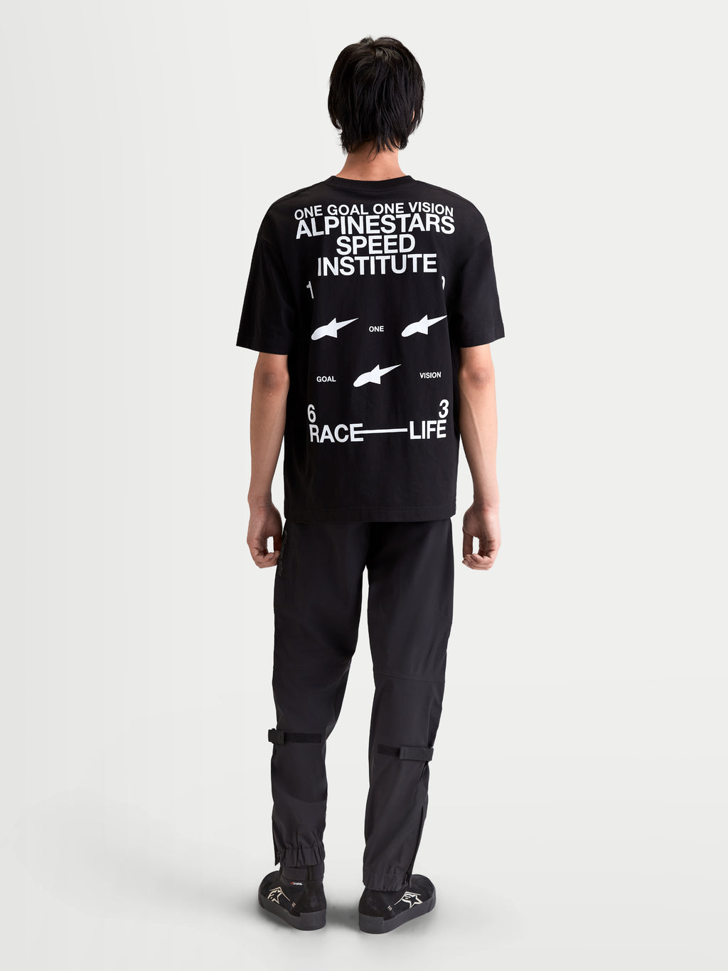Alpinestars Institute Oversized CSF Tee, t-shirt de manga curta, preta e branca, vista traseira com gráficos 'Alpinestars Speed Institute' e 'One Goal One Vision', corte oversized descontraído, casual sportswear.