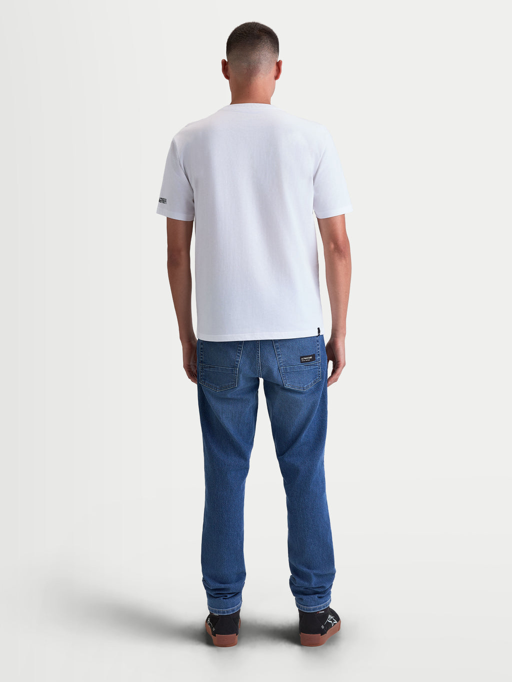 Alpinestars T-Shirt P1 CSF, t-shirt de manga curta unissexo branca, vista traseira, material em mistura de algodão e poliéster, vestuário casual de motorsport