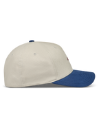 Alpinestars County Canvas Chapéu, boné sportswear areia e azul com aba curva e coroa estruturada.