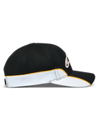 Alpinestars Boné 500 Snapback, boné de sportswear inspirado no motorsport, preto, branco e laranja, perfil lateral com aba curva, coroa estruturada e detalhes de debrum em contraste.