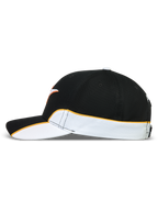 Alpinestars Boné 500 Snapback, boné de estilo motorsport e sportswear, unissexo, preto e branco com debrum laranja, aba curva e coroa estruturada, em sarja de algodão resistente, vista lateral com detalhes de corte e costura.