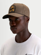 Alpinestars Boné Acme Snapback, boné de desporto em castanho, com pala curva, coroa estruturada e patch bordado com logótipo Astars e acabamento em corda, num modelo