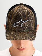 Alpinestars Thicket Realtree Boné trucker, boné sportswear com aba curva e coroa estruturada, camuflado Realtree e preto, com o logótipo Astars bordado a branco na frente num modelo