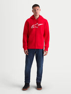 Alpinestars Ageless Zip V3, camisola com capuz em fleece com fecho frontal para homem, vermelho e branco, logótipo branco de destaque no peito, fecho em espiral oculto e punhos canelados, vista frontal num modelo.