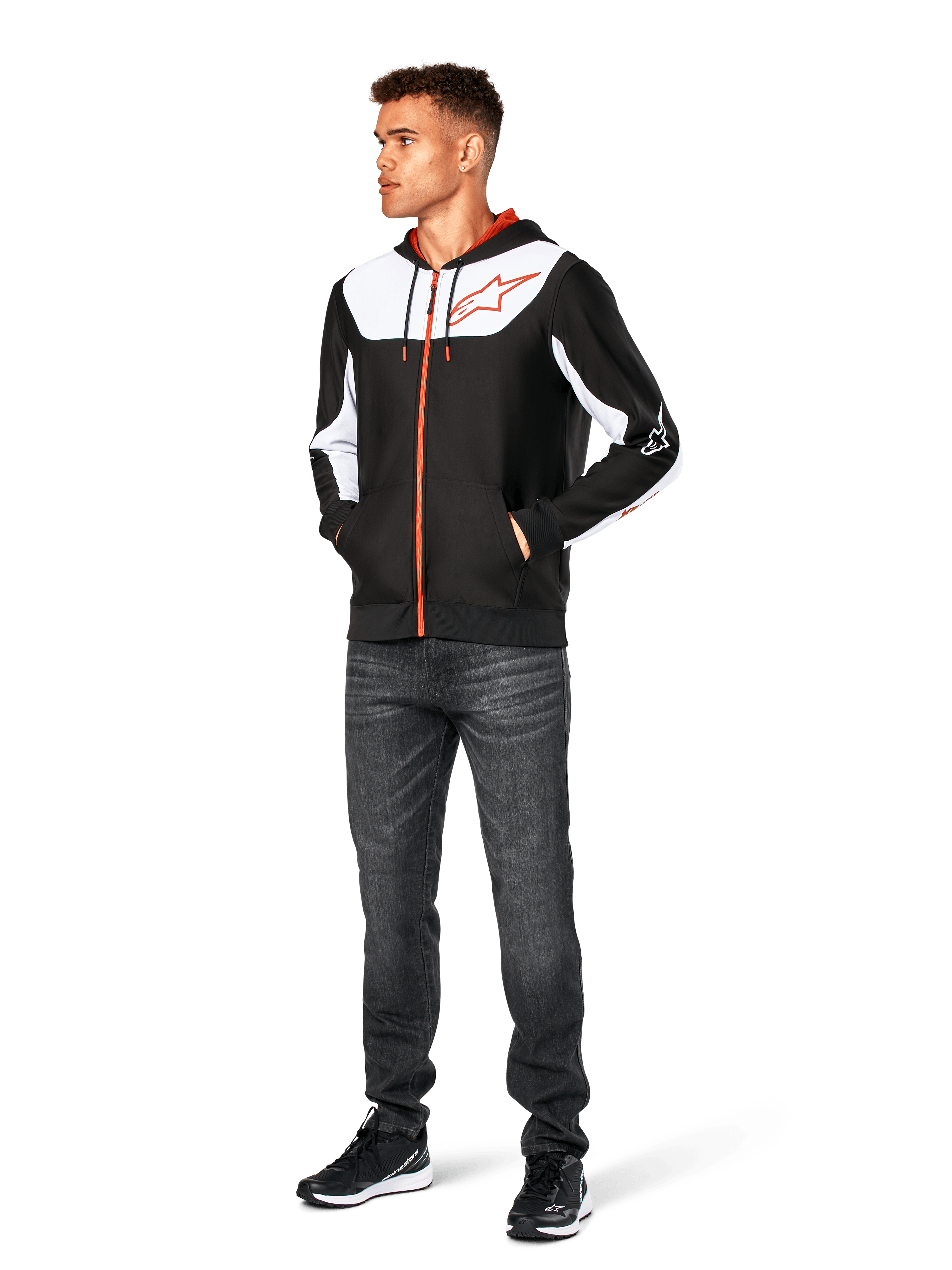 Alpinestars Sessions V3 Hoodie, casual zip-front hoodie, Black White and Red, worn by model with dark jeans and black sneakers, featuring white color-block panels on the chest and sleeves, red zipper and drawcord details, large chest logo, poly fleece motorsport-inspired streetwear