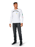 Alpinestars Brundo CSF Tee - Long Sleeve, White, casual sportswear, featuring black 'alpinestars' chest text, a blue star logo, and yellow 'AS' initials, colorful graphics on the sleeve, worn with dark jeans and black sneakers