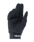 Luvas Youth A-Dura da Alpinestars, pretas, vista da palma mostrando o material em camurça sintética para aderência, punho em neoprene com tira de ajuste em gancho e laço e logótipo branco, concebidas para mountain bike e ciclismo fora de estrada para jovens.