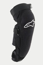 Protetor de Joelho/Canela Alpinestars Vector Pro, preto, com logótipo Alpinestars branco no joelho, painel frontal texturizado resistente à abrasão, alças ajustáveis com gancho e laço, equipamento de proteção respirável para MTB