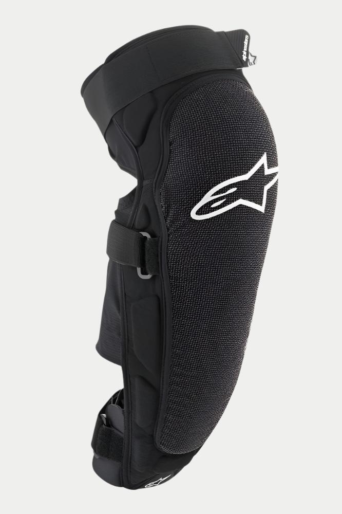 Protetor de Joelho/Canela Alpinestars Vector Pro, preto, com logótipo Alpinestars branco no joelho, painel frontal texturizado resistente à abrasão, alças ajustáveis com gancho e laço, equipamento de proteção respirável para MTB