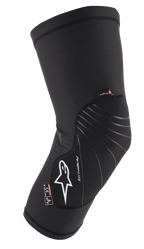 Alpinestars Paragon Lite Knee Protector, Black, lightweight protective gear with textured mesh construction, white logo, gray design lines, slip-on sleeve design, featuring CE Level 1 and Polygiene tags, designed for MTB and off-road cycling