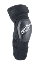 Alpinestars A-Impact Plasma Elite Shield, joelheiras de proteção, pretas com logótipo de estrela branco, concha exterior rígida em TPU, tecido de malha com correia superior ajustável, design ergonómico pré-curvado, proteção para MTB e todo-o-terreno
